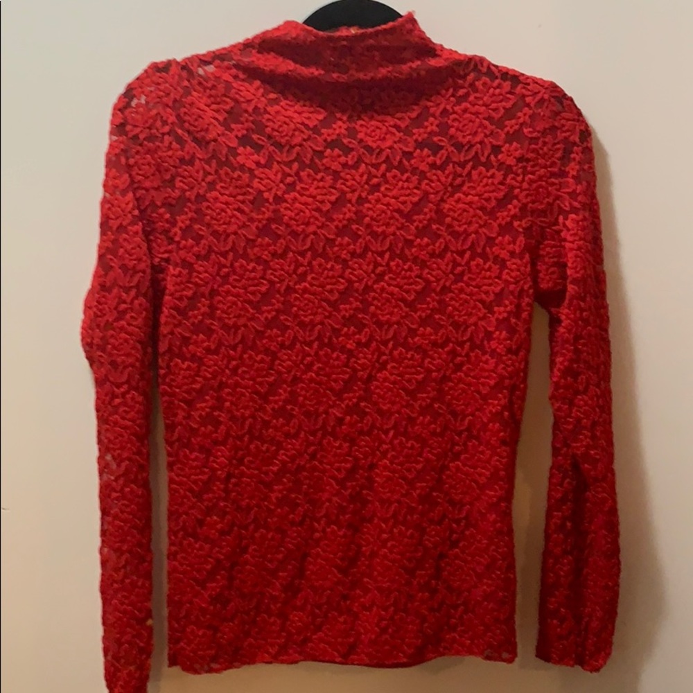 Stylish and sheer red lace top.
